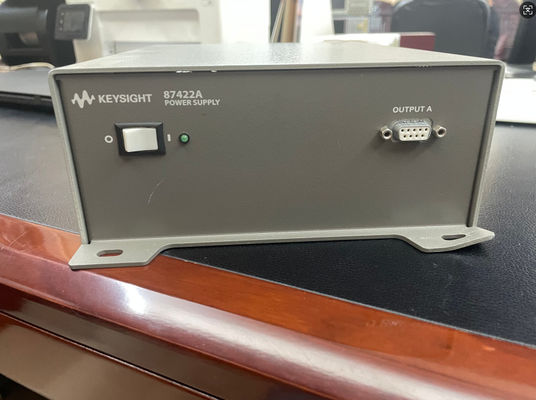 Agilent 87422A Fuente de alimentación de segunda mano 12VDC 15VDC 70W con 83017A 0275 y corriente de modo normal 4 mArms